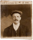 The inscription at the top of the photo could contain the date 3 06. This would be consistent with his apparent age in the photo.
