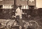 Frank on the back of a bike