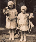 Kitty left and Nellie right as bridesmaids at half sister Lil&#039;s wedding in 1926
