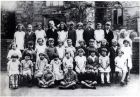 Early school photo of Nellie at East Hoathly School. Nellie is third from the left in the back row.